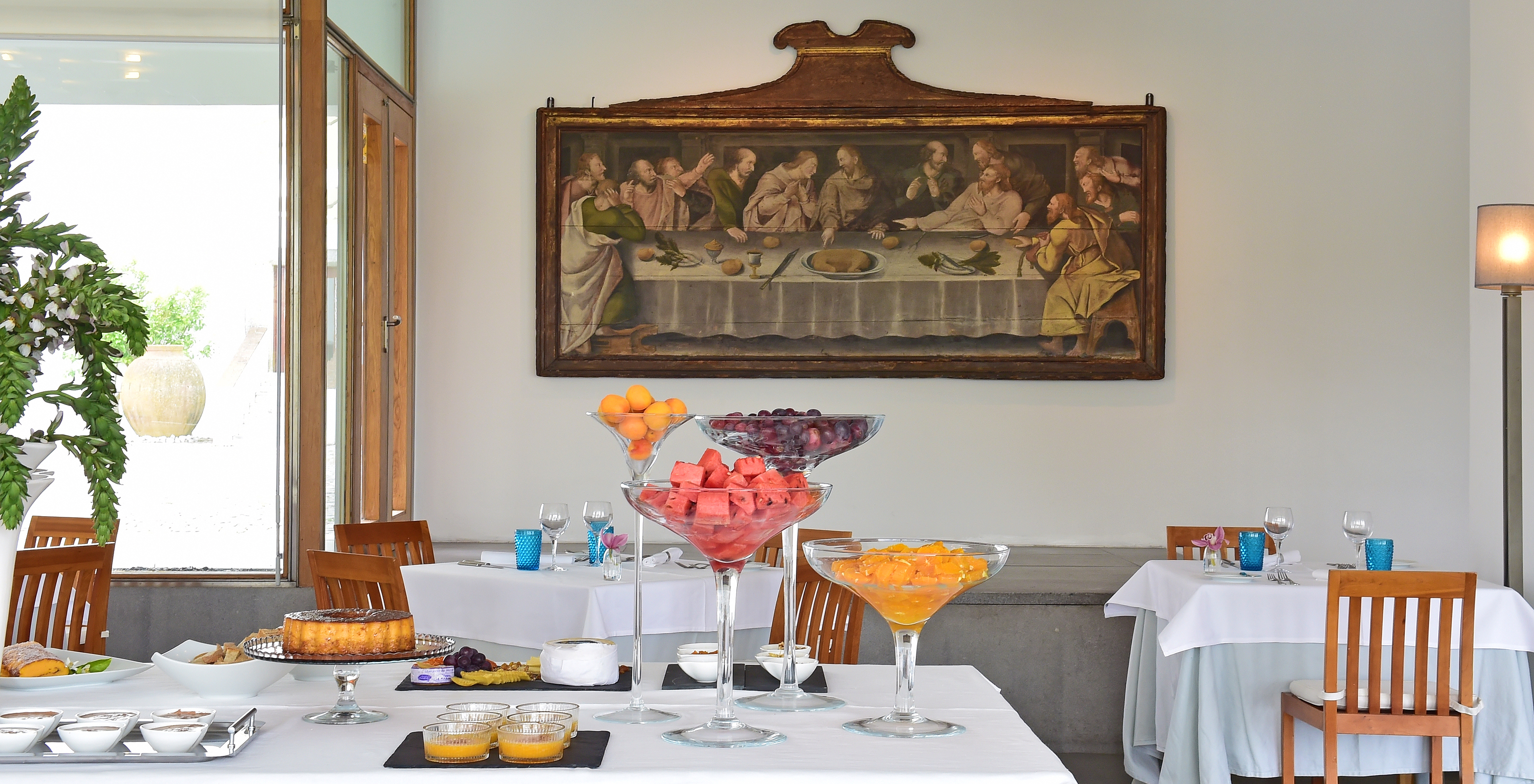 The Pousada Convento Arraiolos restaurant at the Historic Hotel in Arraiolos features a buffet table with sweets and fruit