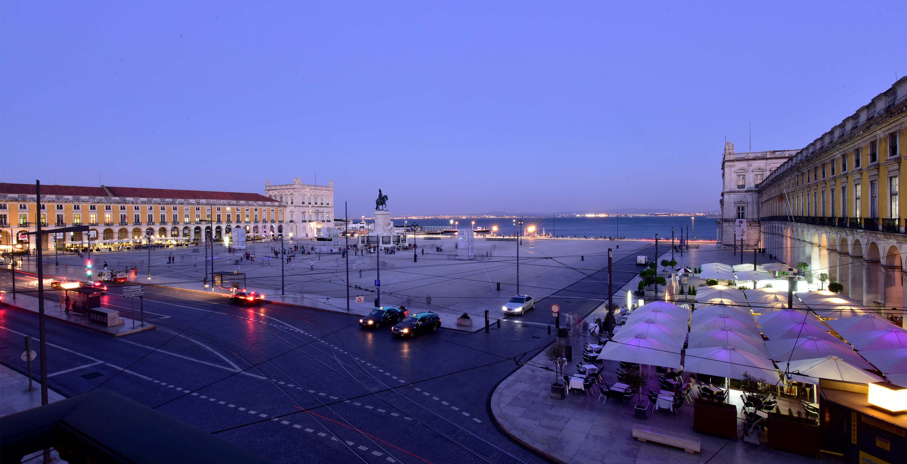 Night view of Terreiro do Paço and the river from Pousada Lisboa Praça do Comércio, a historic hotel in Baixa Lisbon