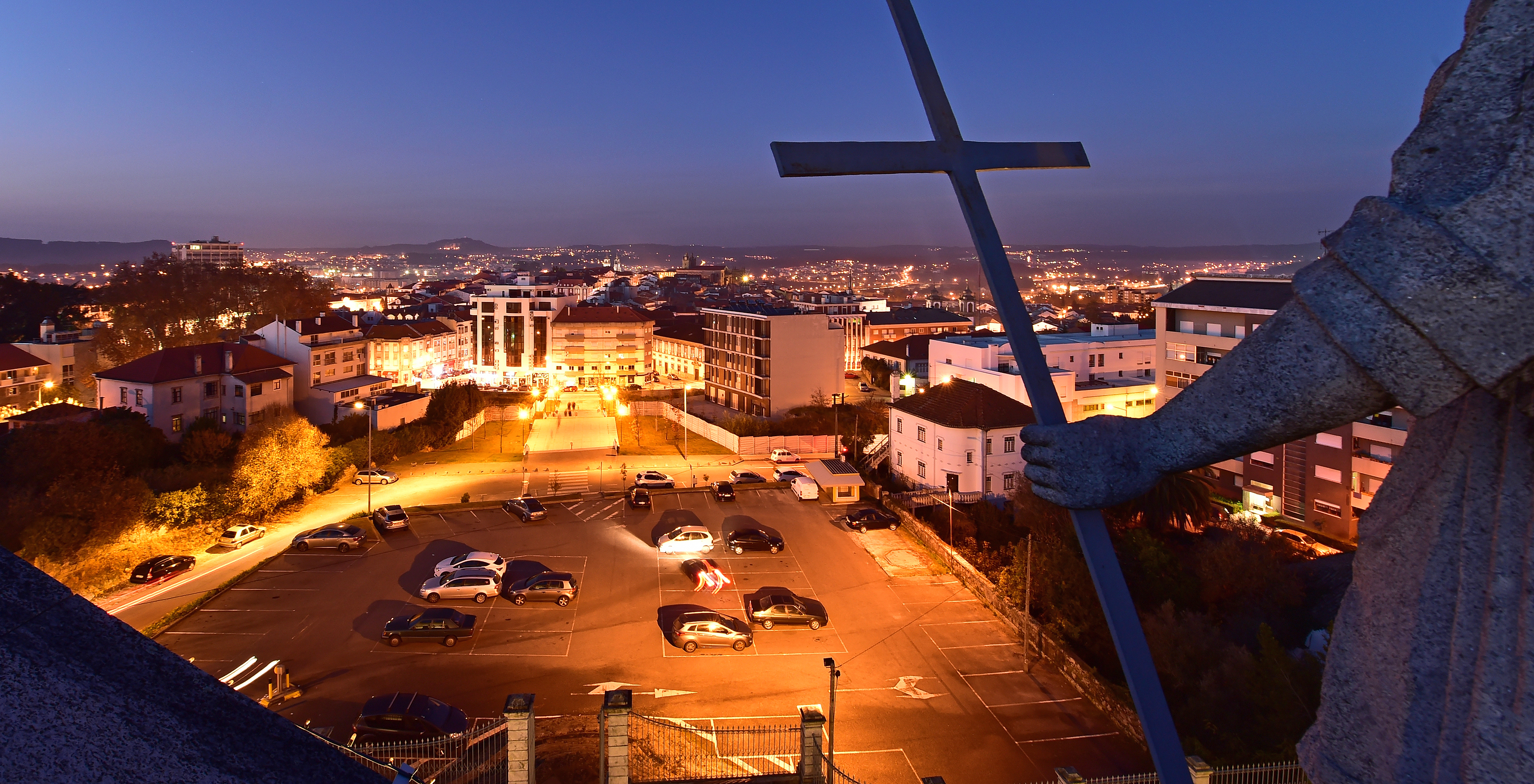 Panoramic view of Viseu city with various buildings and cars